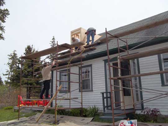 Framing up a new dormer window while renovating an heritage Cape Cod home.