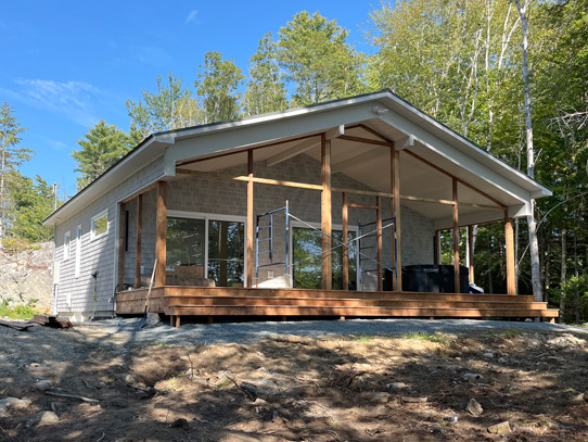 One story bungalow with large covered deck