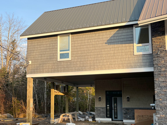 Second floor addition with covered entrance way